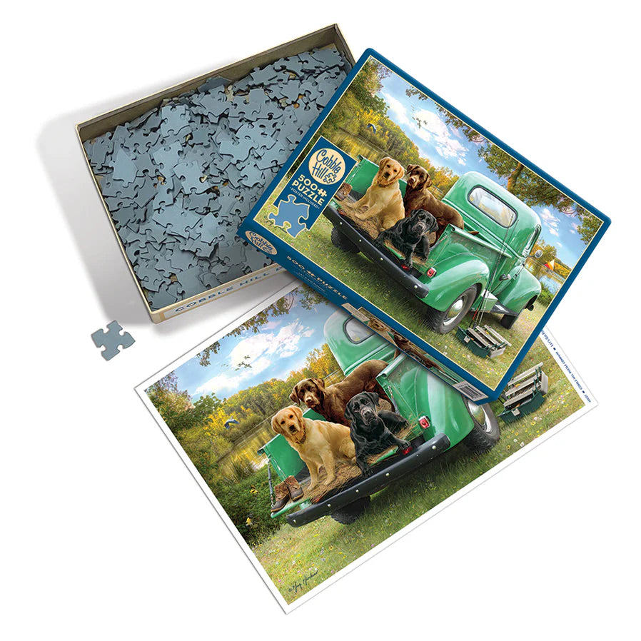 Let's Go Fishing- 500 Piece
From Cobble Hill
The green vintage truck parked by the lakeside is guarded by three lovable dogs as they eagerly await their owner to say, Let's Go Fishing! Cobble Hill's 500 piece puzzles have large size random cut pieces and it includes a reference poster to help in your adventure!