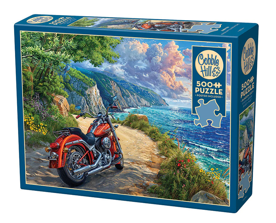 Arrived- 500 Piece
From Cobble Hill
Feel the cool breeze as a red motorcycle rests in the shade along a dirt path by the cliffside. The scenery is breathtaking, with gentle ocean waves glistening from the fading sun. Puffy rolling clouds hint at an impending storm; yet it remains a perfect summer day. Lush green trees and flowers flank the motorcycle, offering a sense of new life as the owner journeys down the dirt road.