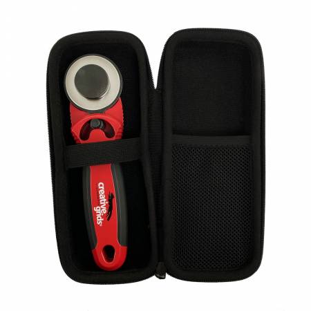 The Creative Grids® 45mm rotary cutter is designed with you in mind. The sleek red metal body adds weight to the cutter so less pressure is required when cutting fabric. The cushioned comfort grip is designed to fit your hand, reducing slips and muscle fatigue.