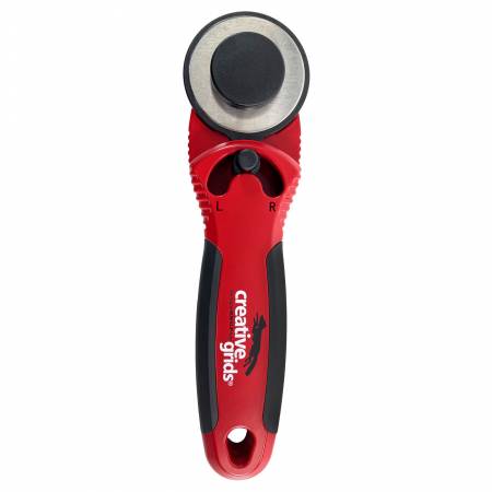 The Creative Grids® 45mm rotary cutter is designed with you in mind. The sleek red metal body adds weight to the cutter so less pressure is required when cutting fabric. The cushioned comfort grip is designed to fit your hand, reducing slips and muscle fatigue.