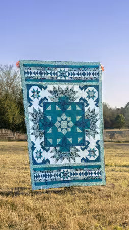 2026 Showstopper 5-Yard Pattern
From - Fabric Cafe
The 2026 Showstopper is a 12-page 5-yard quilt pattern featuring seven reimagined blocks from Fabric Café’s 2025 books in a bold, elegant showpiece design.
