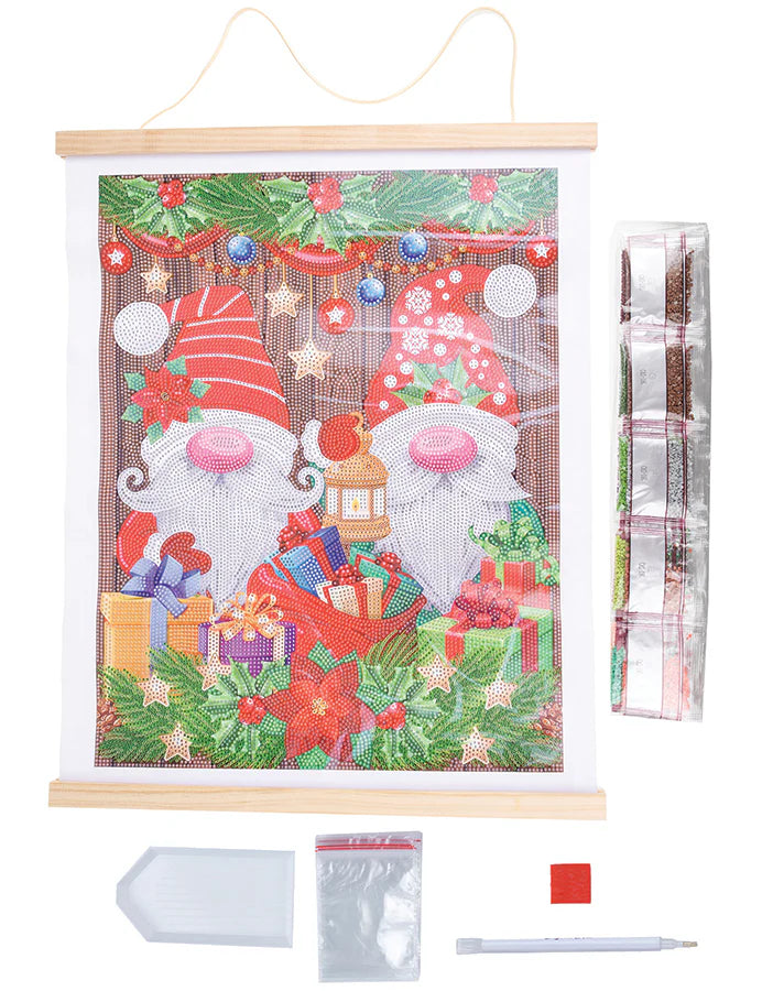 Scroll Kit-Christmas Gnomes - A delightful holiday-themed craft experience that brings the magic of Christmas to life with sparkling crystals and festive gnomes.
Imagine unrolling the scroll to reveal a charming scene filled with whimsical Christmas gnomes surrounded by presents, garlands, lanterns, and the timeless beauty of poinsettias. Each element is intricately detailed, waiting to be adorned with a dazzling array of crystals.