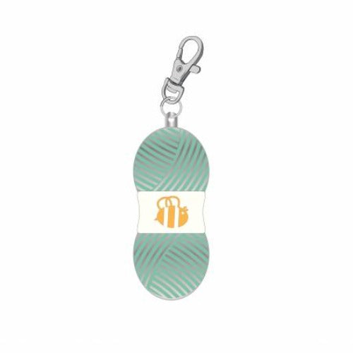 The Chunky Thread Enamel Happy Charm in Sea Glass colour Approximate size is 2 cm x 5 cm. From Riley Blake Designs Designed by Lori Holt Made of: Enamel Size: 2cm x 5cm