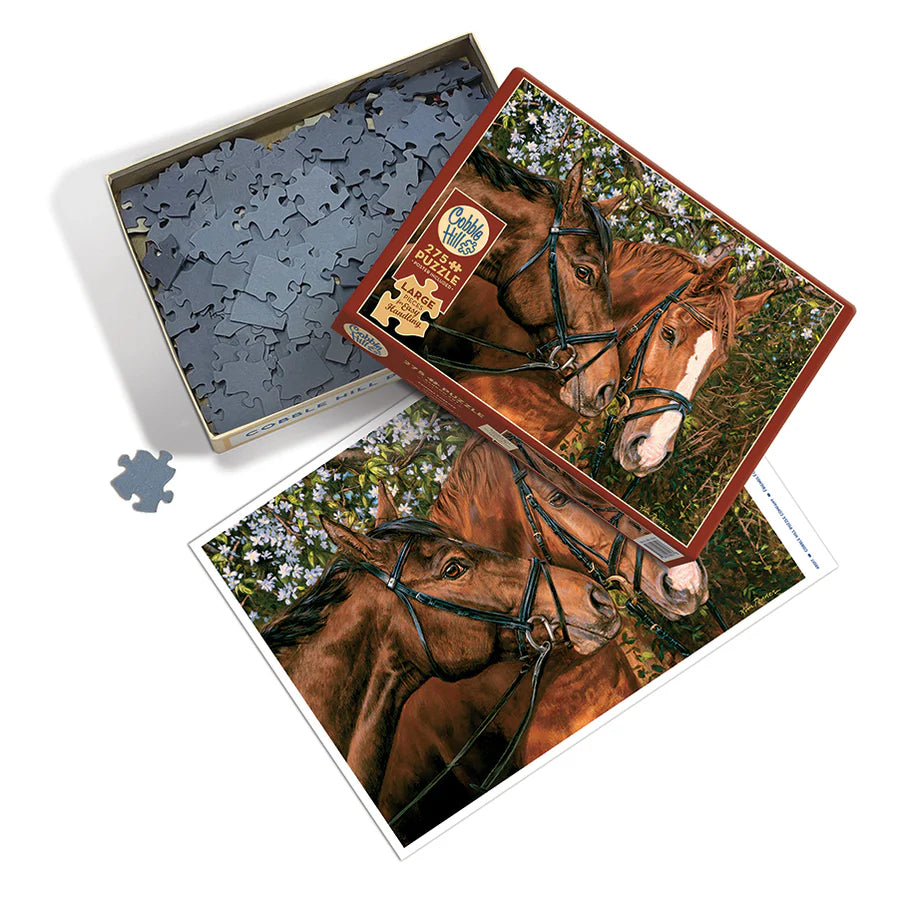 Friends Forever -Easy Handling- 275 Pieces
From Cobble Hill
The case of 'two heads are better than one' rings true in Friends Forever Easy Handling 275 piece puzzle. The lovely horses nuzzle each other as they walk past their favorite flowering hedge.