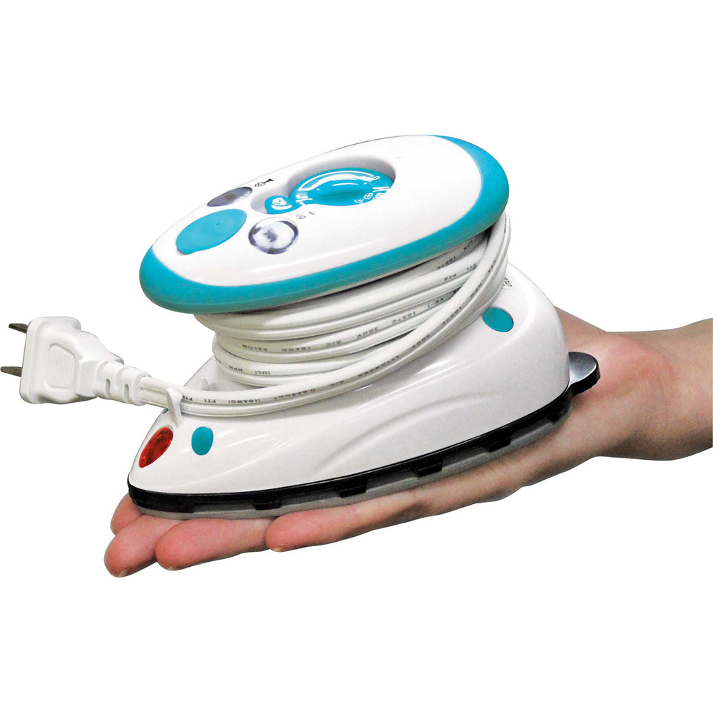 Go Iron Mini Travel / Craft Iron
Exceptionally compact travel steam iron. Rubber ring around the handle for a comfortable ergonomic fit. Non-stick soleplate. Dry/continuous steam. Dual voltage 100 V - 240 V. Heats up quickly - 30 seconds. 40 ml water tank. Includes: water filling cup and storage bag.