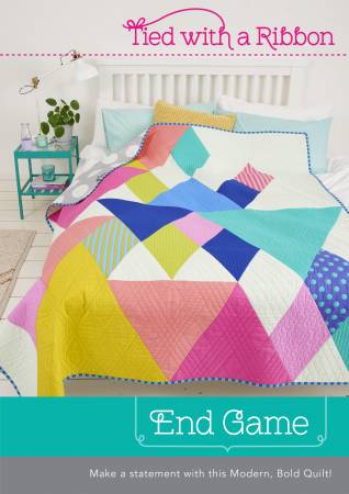 End Game Quilt Pattern From Creative Abundance By Jemima Flendt of Tied With A Ribbon. Quilt pattern features both the Large Quilt size along with a fun Mini Quilt. Notions Required - 8.5" and 3" Equilateral Triangle Templates (Sold Separate)