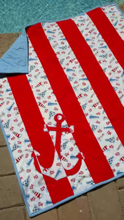 Shiplap Quilt Pattern
From Rachel Rossi Design
By Rachel Rossi
Finished Sizes: Baby 36" x 50", Throw 60" x 60", Twin 60" x 86"
Shiplap is a simple, modern pattern for a nautical quilt. This design lends itself well to a more masculine quilt, but can be just a girly or child-friendly with the right fabrics! Choose two contrasting fabrics, and you’ll be on your way!