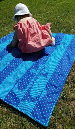 Shiplap Quilt Pattern
From Rachel Rossi Design
By Rachel Rossi
Finished Sizes: Baby 36" x 50", Throw 60" x 60", Twin 60" x 86"
Shiplap is a simple, modern pattern for a nautical quilt. This design lends itself well to a more masculine quilt, but can be just a girly or child-friendly with the right fabrics! Choose two contrasting fabrics, and you’ll be on your way!