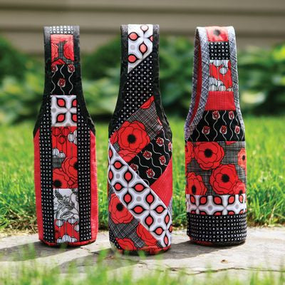 Sample Idea in choosing fabric to make the Quilt As You Go Wine Totes 3 pack
By June Taylor Inc.
Reusable and giftable wine tote patterns on printed batting for easy sew-by-number construction. Each package contains three totes. Choose your own fabric.
Finished tote size is approximately 4" x 16".
