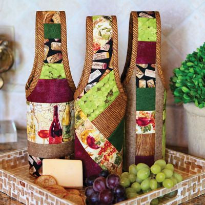 Sample Idea in choosing fabric to make the Quilt As You Go Wine Totes 3 pack
By June Taylor Inc.
Reusable and giftable wine tote patterns on printed batting for easy sew-by-number construction. Each package contains three totes. Choose your own fabric.
Finished tote size is approximately 4" x 16".