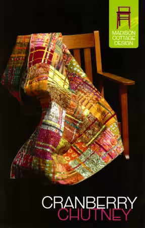 Cranberry Chutney Quilt Pattern
From Madison Cottage Design
By Kenna Ogg
Finished Sizes: Table Runner: 16" x 72"
Throw: 56" x 64"
XL Throw: 64" x 72"
Vibrant patchwork design with plaids, stripes, and floral motifs
Colours include cranberry, mustard, and green