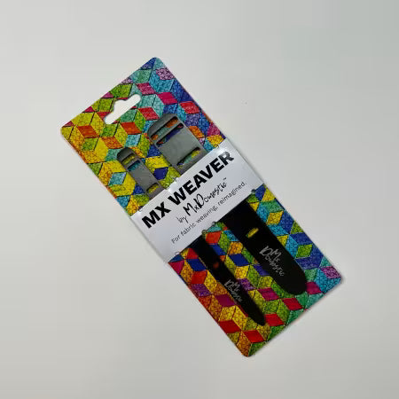 Mx Weaver
From: Mx Domestic LLC, By Mathew Boudreaux
Made of: Stainless Steel
Includes: Two Weaving Tools
Size: 1in x 6in x &amp; 1/2in x 6in
Use: For Fabric Weaving, threading elastic or ribbon, and mixed media crafting. Can also be used as a bodkin replacement and strip guiding tool