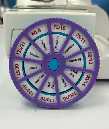 Needle Noter
From NeedleNoter
You need a Needle Noter to track which needle you left in your machine. The wheels spin to set the size and type of needle you place in your machine. Change the setting each time you change the needles.