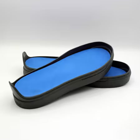 Patchwork Kicks blue shoe inserts in dark gray rubber sneaker soles.