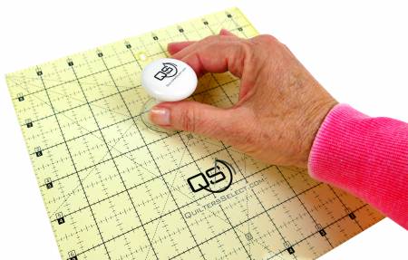 Select Ruler Handle-From Quilter's Select-Helps you accurately mark and cut your materials and makes adjusting the placement of rulers a breeze.