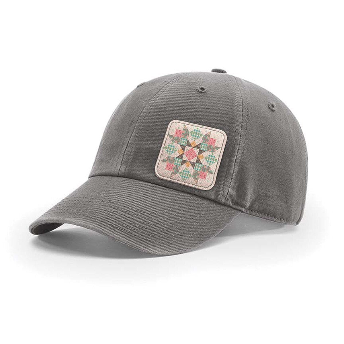 Lori Holt Farmer's Daughter Leather Patch Baseball Hat
From Riley Blake Designs
The Leather Patch Baseball Hat by Lori Holt of Bee in my Bonnet features a 100% natural leather patch with a quilt block. It is one size fits most with an adjustable buckle. It is 100% cotton with a six-panel relaxed fit.