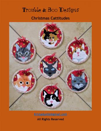 Christmas Cattitudes  From Trouble & Boo Designs By Krista T Dyelle  Christmas Cattitudes – 7 - four inch round ornaments Perfect for the cat lover. Super easy pattern of quilted cat ornaments.