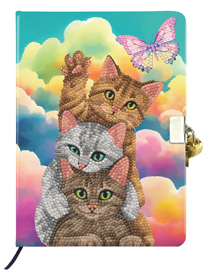 Secret Diary Kit-Kitten Clouds-Crystal Art-A personal journal or notebook known as a "diary" is used to keep track of everyday experiences, thoughts, feelings, and reflections. It is a tool that gives people a platform for self-expression and personal development by enabling them to reflect on and document their lives. Imagine keeping a secret diary with a beautiful crystal art design and writing about your day in it. Each diary includes 48 lined pages and is 6.1" x 8.5"