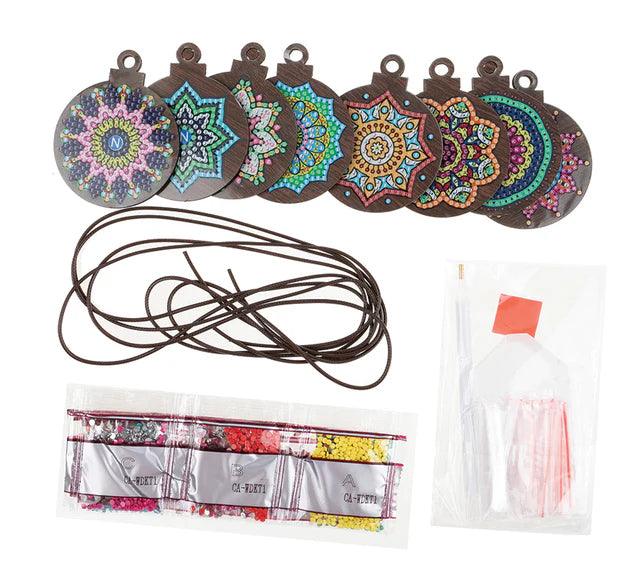 Crystal Art Hanging Mandala Deco Kit-Includes:
8 Decoration-Pre-sorted bags of crystals-Pick-up pen-Tray-Jelly wax-Instructions