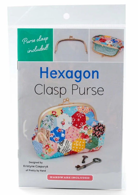 Use English paper piecing to construct this adorable hexagon purse. This sweet clutch is the perfect size for storing cosmetics, money, and other essentials.  Finished Size: 4 ¾" x 7" (12 x 18 cm) Kit Includes: 2.5" x 5 ¼” (6.5 x 13.5 cm) rose gold metal clasp and paper string for installation.