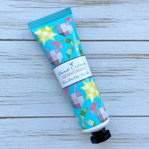Riley Blake Designs - Quilty Hands Hand Cream shown in Coconut Dreams Scent. Each tube has a twist-off lid and contains 30 ml of hand cream.