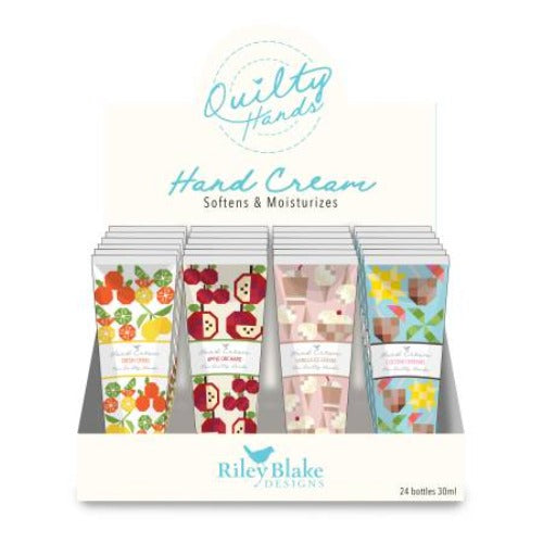 The Riley Blake Designs Quilty Hands Hand Cream features 4 different delightful quilty patterns and scents: fresh citrus, apple orchard, vanilla ice cream, and coconut dream. Collect all four! Each tube has a twist-off lid and contains 30 ml of hand cream.